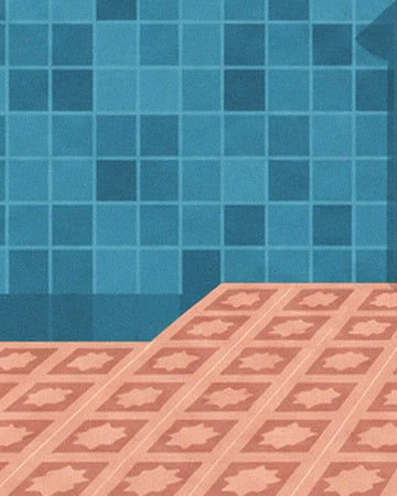 The floor with pink star patterns at the foot of the wall covered in blue tiles