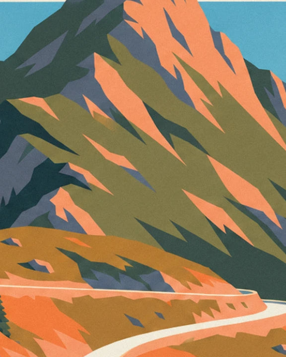 The rock face with orange and green edges, with a ribbon of road below