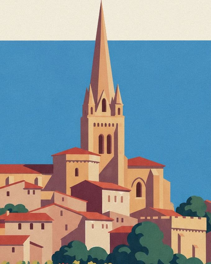 The slender bell tower of Saint-Émilion above the houses with red roofs