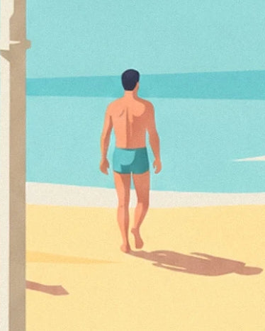 A man seen from behind in turquoise shorts on the sand, facing the sea