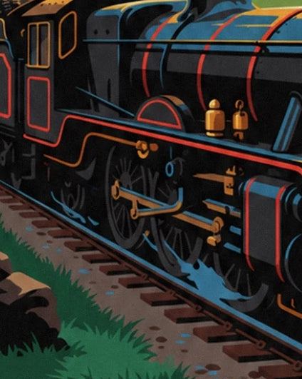 Les grandes roues noires, les bielles dorées et les liserés rouges de la locomotive