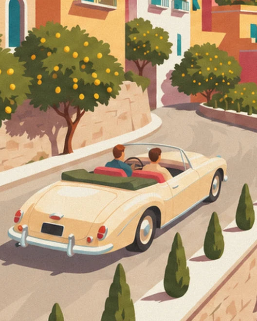 The cream convertible and its 2 passengers on the winding road between lemon and cypress trees