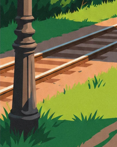 Le lampadaire en fonte au bord des rails, entre herbe verte et ballast ocre