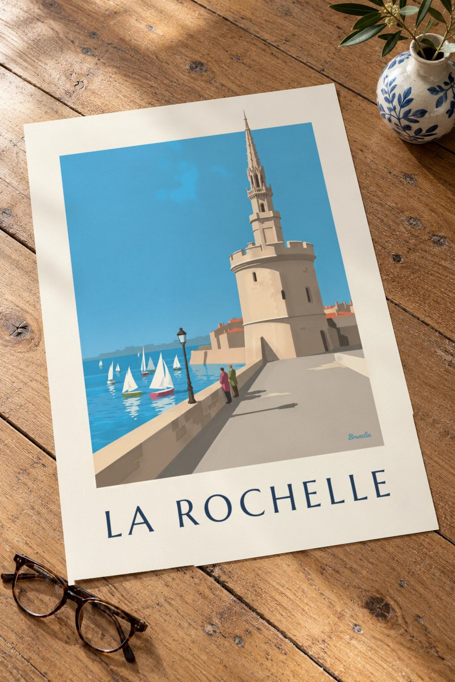 Plakat Wieży Latarni w La Rochelle : na stole