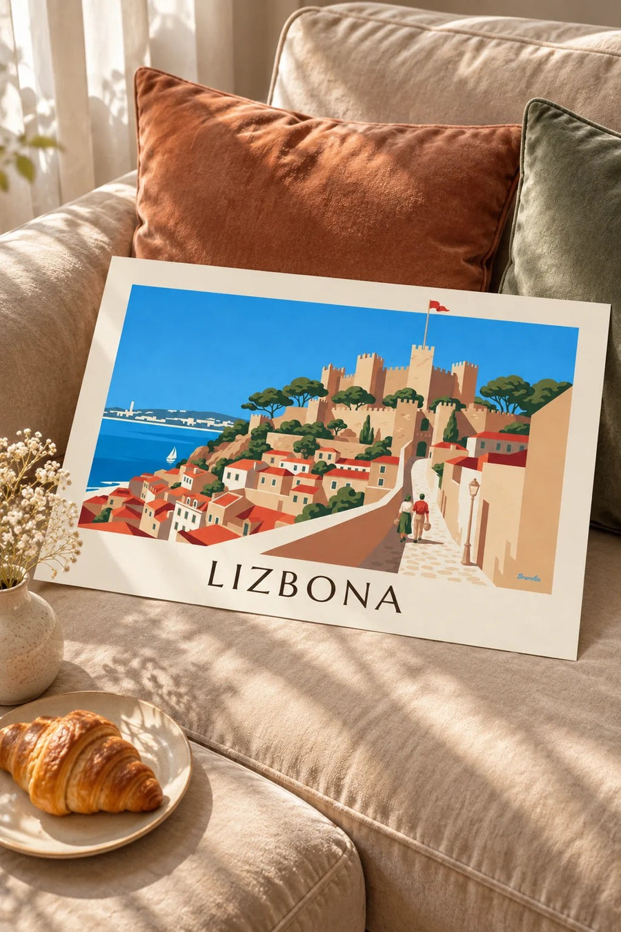 Plakat zamek św. Jerzego i dachy Alfamy w Lizbonie: leżący na stole