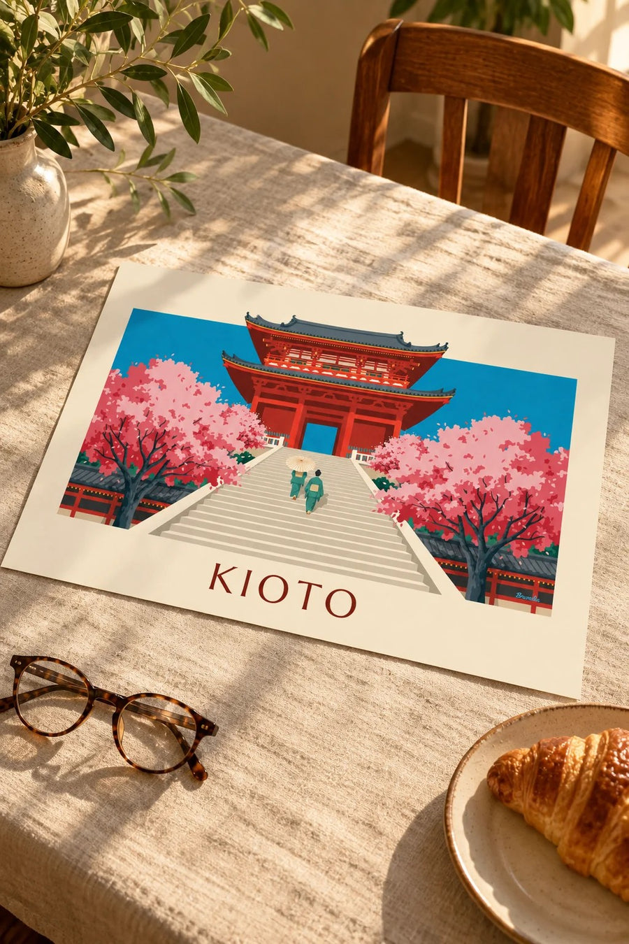 Plakat cynobrowa brama Kiyomizu-dera i wiśnie w Kioto: leżący na stole
