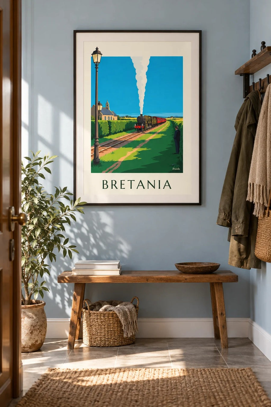 Plakat lokomotywa parowa na bretońskiej wsi: w ramie na ścianie