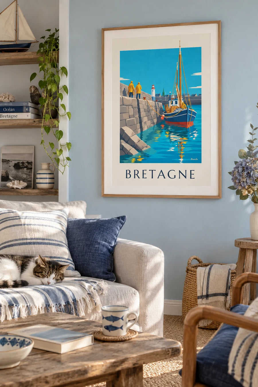 Poster of a Breton fishing boat returning to a granite harbor: framed on the wall