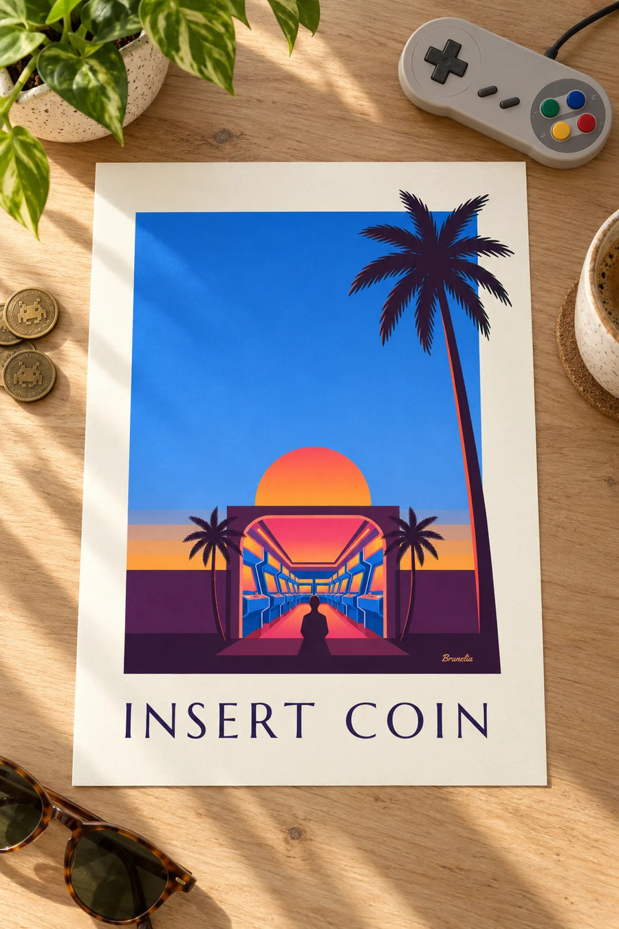 Affiche salle d'arcade, néons et soleil couchant : posée sur une table