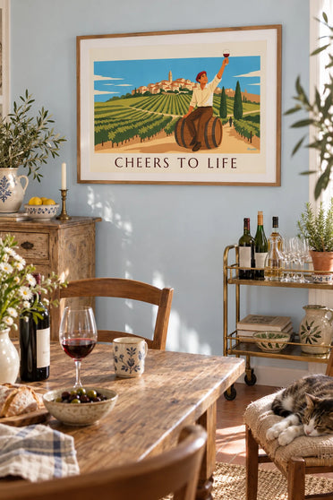Poster of a man sitting on a wine barrel, glass raised: framed on the wall